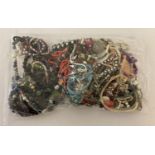 A sealed bag of assorted modern costume jewellery, to include bracelets and necklaces. Approx. 2.