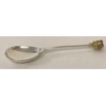 A Silver Jubilee silver spoon with crown finial by Mappin & Webb. Monarch coat of arms to reverse of
