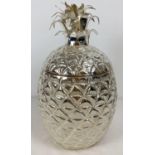 A large silver plated ice bucket in the shape of a pineapple, with hinged lid. Approx. 35cm tall.