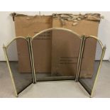 2 boxed brass framed triple folding fire screen's. In as new condition.