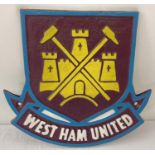 A painted cast iron West Ham United FC wall plaque, with fixing holes. Approx. 23cm x 24cm.