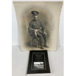 A photographic portrait of a WWI soldier in uniform. Together with a copy of "The Silent Cities;