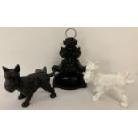 2 cast iron Highland Terrier dog doorstops, one black and one white. Together with an antique ornate