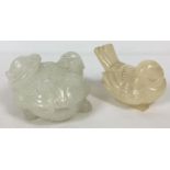 2 carved natural stone animal and bird paperweights. An oriental toad carrying a bat and a turtle on