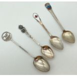 4 vintage silver collectors spoons in varying sizes and designs from Canada, Seaton, Wein and
