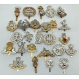 A collection of 26 assorted Birmingham Mint military cap badges. With slider fixings.