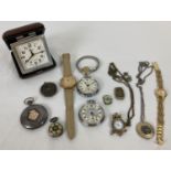 A collection of vintage and modern pocket watches, wrist watches and a travelling clock. In