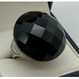 A large faceted black onyx cocktail ring by Whitney Kelly. Marked '925 WK' to inside. Ring size