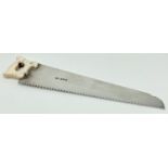 An Early 20th Century, ivory handled silver cucumber saw. Fully hallmarked for London 1912 and