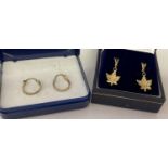2 boxed pairs of earrings. A small pair of 9ct gold hoops with diamond cut pattern together with a