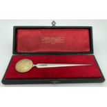 A cased Stuart Devlin silver letter opener made to commemorate the Queen's Silver Jubilee, 1977.