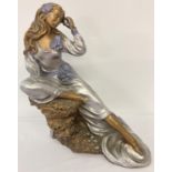 A 1990's Alice Heath Austin Sculpture entitled "Sea Whispers" finished in metallic tones. Signed and