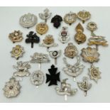 A collection of 26 assorted Birmingham Mint military cap badges. With slider fixings.