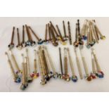 2 bags of assorted wooden and plastic handled beaded lacemaking bobbins. 30 bobbins with turned