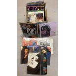 A box of vintage LP records to include albums and 12 inch singles. Artists include, Dusty