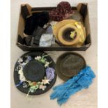 A box of assorted vintage hats, belts & gloves. To include Harris Tweed trilby hat and several