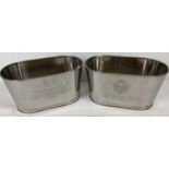 A pair of Bollinger Champagne buckets with engraved details to sides. One side is engraved with a