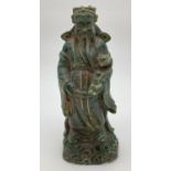 A Chinese carved green jade figurine of an Oriental Deity. Approx. 20cm tall.