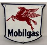 A painted aluminium Mobilgas wall plaque, with fixing holes. In red, white and blue colours. Approx.