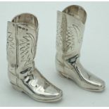 A pair of novelty silver salt and pepper shakers in the form of cowboy boots. Fully hallmarked for