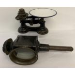 An antique metal and glass panelled carriage lamp together with a set of cast iron scales with