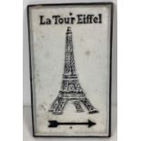 A black and white painted cast iron wall sign with directional arrow for the Eiffel Towel. Approx.