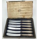 A boxed set of 1920's silver bladed butter knives, fully hallmarked Sheffield 1929. With Barker