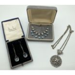 3 items of vintage costume jewellery. A clear & blue stone set diamanté necklace, a pair of glass