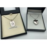 2 boxed silver necklaces. A dog tag style pendant on a 20 inch ball chain together with a