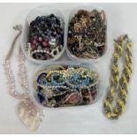 3 tubs of vintage and modern costume jewellery necklaces in varying conditions.