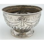 A Mappin & Webb Victorian silver bowl with bow and swag detail, raised on a pedestal foot.