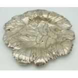 A late 19th century silver plated fruit bowl in the form of vine leaves. Stamped to underside with