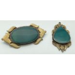 A vintage ethnic design silver and brass pendant and matching brooch, each set with green agate.
