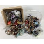 2 boxes of assorted vintage and modern costume jewellery in varying conditions. To include