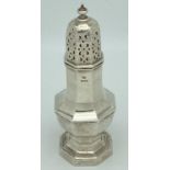 A William Hutton & Sons silver octagonal shaped sugar sifter raised on a stepped pedestal foot. Both