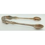 A large pair of Elizabeth Eaton Victorian silver sugar tongs with decorative arms. Fully