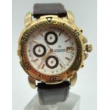 A Claude Valentini Millennium chronograph style men's wristwatch. Gold tone case, brown leather