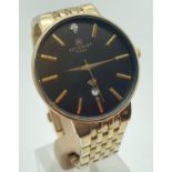 A men's gold tone bracelet strap wristwatch by Accurist. Black face with gold tone hour markers