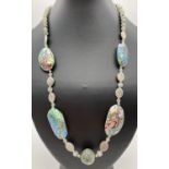 A 24" costume jewellery necklace made from abalone shell, green agate and white metal beads. With