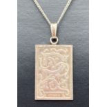 A vintage square silver pendant with letter P and floral decoration on an 18" fine curb chain.