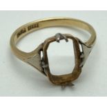 A vintage 18ct gold dress ring (stone missing) with platinum detail to shoulders and claws.