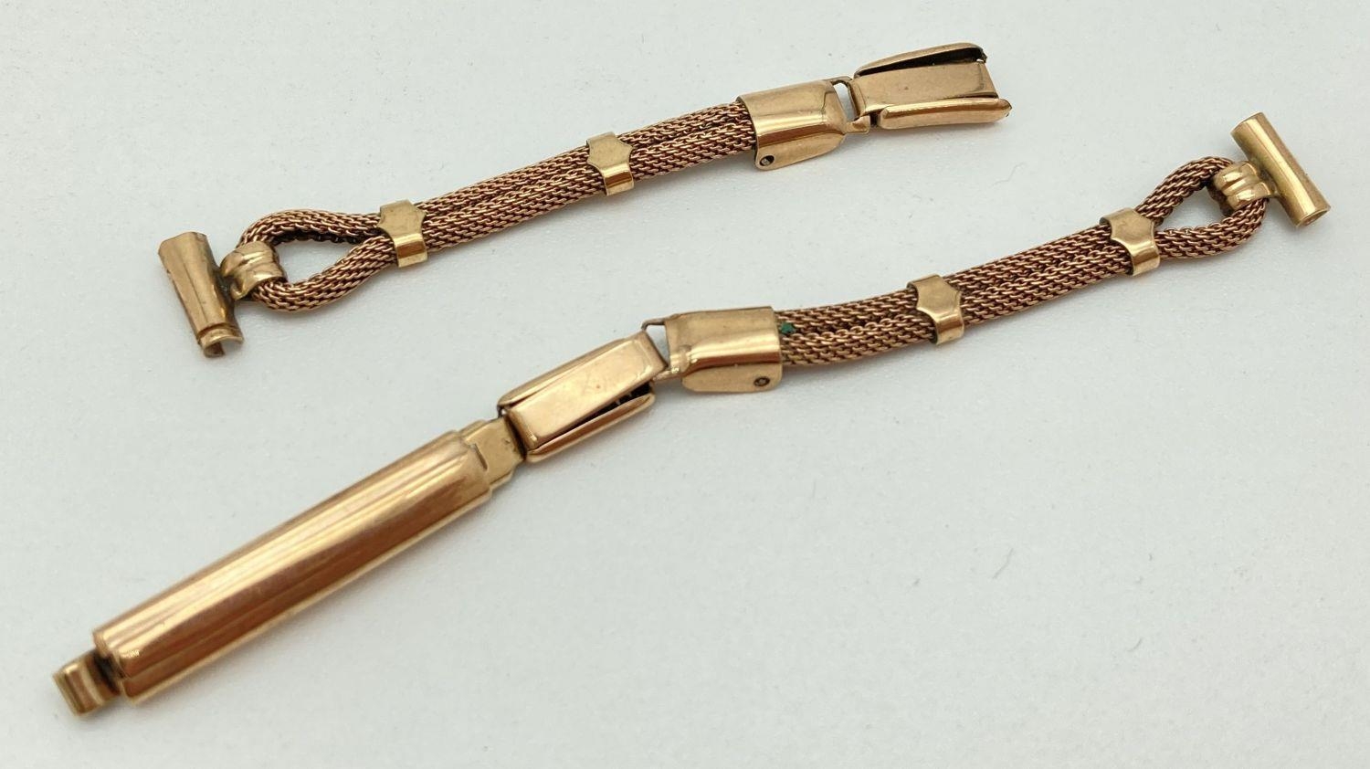 A vintage 9ct gold ladies wristwatch strap in a banded mesh design. Marked 9ct throughout. Total