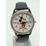 A Disney Time Works Mickey Mouse wristwatch with moving arms for hour and minutes hands. Stainless