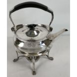 A late 19th century silver plated spirit kettle and stand, with engraved detail. Wooden handled