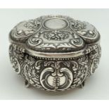 An Armagan 900 decorative four footed silver trinket box with fluted style panels and velvet lining.