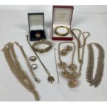 A quantity of assorted vintage gold tone costume jewellery. To include necklace and matching