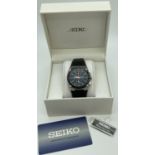 A men's Seiko Sportura chronograph wristwatch with black leather strap. With date function, 100