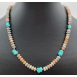 A 17" leopard skin jasper and turquoise beaded necklace with gold tone T bar clasp. Ex jewellery