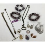 A collection of costume jewellery to include necklaces, earrings and glass bead bracelets.