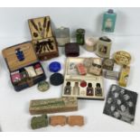 A collection of vintage cosmetic vanity items to include Manicure sets, talc's, train shaped soap